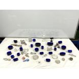 QUANTITY OF BLUE GLASS CONDIMENT LINERS, AND GLASS STOPPERS