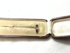 9CT GOLD AMETHYST AND SEED PEARL SET STICK PIN, IN ORIGINAL LEATHER BOX