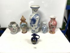 BLUE AND WHITE ORIENTAL DESIGN VASE, 45CMS WITH FOUR OTHER CHINESE STYLE VASES AND A JUG