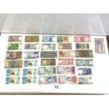 QUANTITY OF MIXED FOREIGN BANK NOTES, INCLUDES BRASIL, MAURITIUS AND MORE