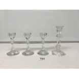 THREE VILLEROY AND BOCH GLASS CANDLESTICKS, 14CMS, AND A SINGLE GLASS CANDLESTICK