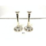 PAIR OF HALLMARKED SILVER CIRCULAR CANDLESTICKS, LONDON 2000, MAKER M C HERSLEY AND SON LTD, 22CMS