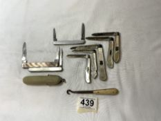 FIVE MOTHER O PEARL HANDLED SILVER FRUIT KNIVES AND THREE OTHER KNIVES WITH A BUTTON HOOK