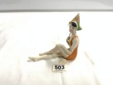 CONTINENTAL PORCELAIN ART DECO FIGURE OF A BATHING LADY AND PARASOL