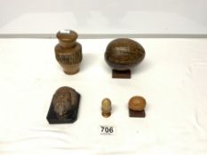 TWO CARVED NUTS - CONVERTED TO BOXES, A TREEN COTTON HOLDER, A SMALL CARVED SOFTWOOD BUST OF ARAB