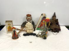 PAINTED WOODEN INDIAN PUPPET, ANOTHER PAINTED PUPPET, RUSSIAN (CCCP) TIN PLATE WIND UP FIGURE, AND