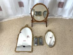 OVAL BRASS FRAMED WALL MIRROR, 35 X 68CMS, YEW WOOD SKELETON SWING MIRROR, AND TWO FLORAL STILL