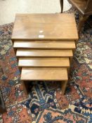 A NEST OF FIVE SOLID OAK ERCOL, TABLES 50 X 30CMS