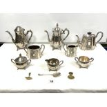 ENGRAVED THREE-PIECE PLATED TEA SET, AND A PLATED FIVE-PIECE TEA AND COFFEE SET