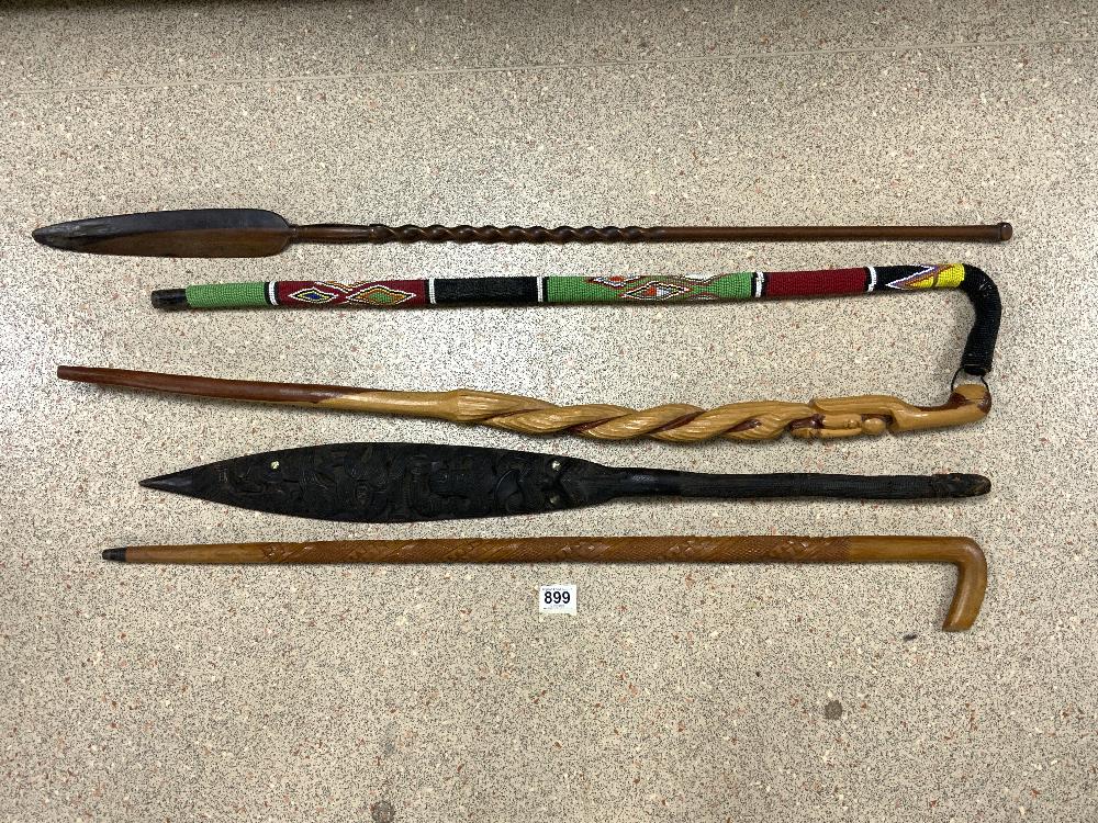 ETHNOGRAPHICAL STICKS WITH POSSIBLY MAORI CEREMONIAL WAR PADDLE