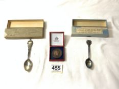 TWO HALLMARKED SILVER SOUVENIER SPOONS, AND A 1902 CORONATION MEDALION IN THE ORIGINAL BOX