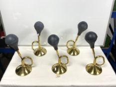 FIVE BRASS HORNS