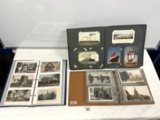 THREE POSTCARD ALBUMS CONTAINING VARIOUS SUBJECTS - STREET VIEWS, BUILDINGS, SEARCHLIGHT DISPLAY,