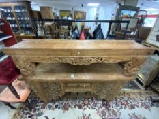 A 20TH CENTURY CARVED EASTERN ALTAR TABLE AND MATCHING STAND, 180 X 50 X 78CMS