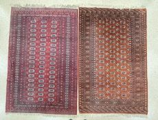 TWO PERSIAN SILK BAKHARA RED GROUND RUGS, BOTH 190 X 126CMS