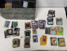 A QUANTITY OF POKEMON AND DIGIMON COLLECTORS CARDS