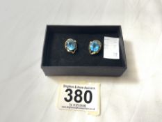 PAIR OF 14K GOLD EARRINGS WITH BLUE STONES