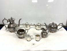 FOUR PIECE SILVER-PLATED TEA AND COFFEE SET AND A FOUR PIECE HOTEL PLATED TEA SET