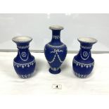 A PAIR OF DARK BLUE JASPER WARE ADAM STYLE VASES, 20CMS (ONE WITH CHIP TO RIM) AND A SINGLE