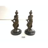 A PAIR OF BRONZE FIGURES OF CLASSICAL FEMALES ON CIRCULAR MARBLE BASES, 22CMS