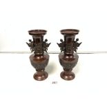 PAIR OF LATE 19TH CENTURY JAPANESE BRONZE BALUSTER VASES WITH MOULDED RELIEF DETAIL AND BIRD