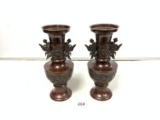 PAIR OF LATE 19TH CENTURY JAPANESE BRONZE BALUSTER VASES WITH MOULDED RELIEF DETAIL AND BIRD