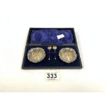 PAIR HALLMARKED EMBOSSED SILVER CONDIMENTS AND SPOONS IN A CASE BIRMINGHAM 1903 MAKER - WILLIAM