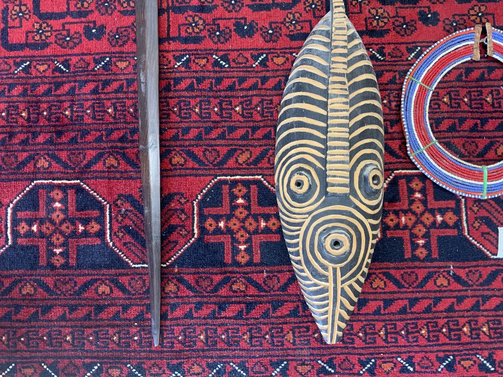 TWO WOODEN TRIBAL MASKS, A BEARDED NECK PIECE, SPEARS AND STICKS - Image 4 of 7