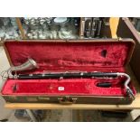 A VINTAGE BASE CLARINET BY BOOSEY & HAWKES IN A FITTED CASE