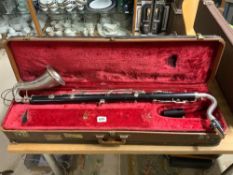 A VINTAGE BASE CLARINET BY BOOSEY & HAWKES IN A FITTED CASE