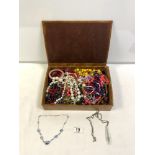 A QUANTITY OF COSTUME BEADS/JEWELLERY