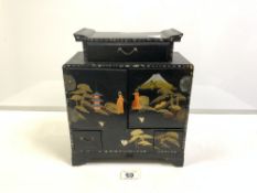 JAPANESE STYLE BLACK AND GOLD LACQUERED MUSICAL JEWELLERY CABINET