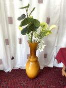 VERY LARGE GOLDEN GLAZED GLASS VASE, 91CMS COMES WITH PLASTIC FLOWERS
