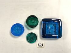 ERIC HOGLUND - FOUR BLUE GLASS EMBOSSED PAPERWEIGHTS