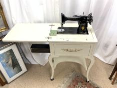 SINGER ELECTRIC SEWING MACHINE IN POP-UP WHITE CABINET - MODEL SEW-TRIC LTD NUMBER - ED982924