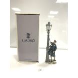 LLADRO FIGURE OF A STREET LIGHTER FIGURE, 46CMS