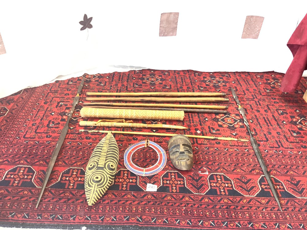 TWO WOODEN TRIBAL MASKS, A BEARDED NECK PIECE, SPEARS AND STICKS - Image 6 of 7
