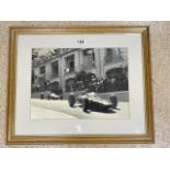 FRAMED PHOTOGRAPH OF GRAHAM HILL F1 RACING 1960'S, 38 X 28CMS