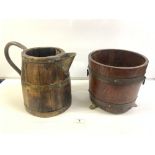 ANTIQUE BRASS BOUND AND BRASS HANDLE WATER JUG, 28CMS, AND A BRASS BOUND OAK PLANTER ON CLAW FEET