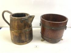 ANTIQUE BRASS BOUND AND BRASS HANDLE WATER JUG, 28CMS, AND A BRASS BOUND OAK PLANTER ON CLAW FEET