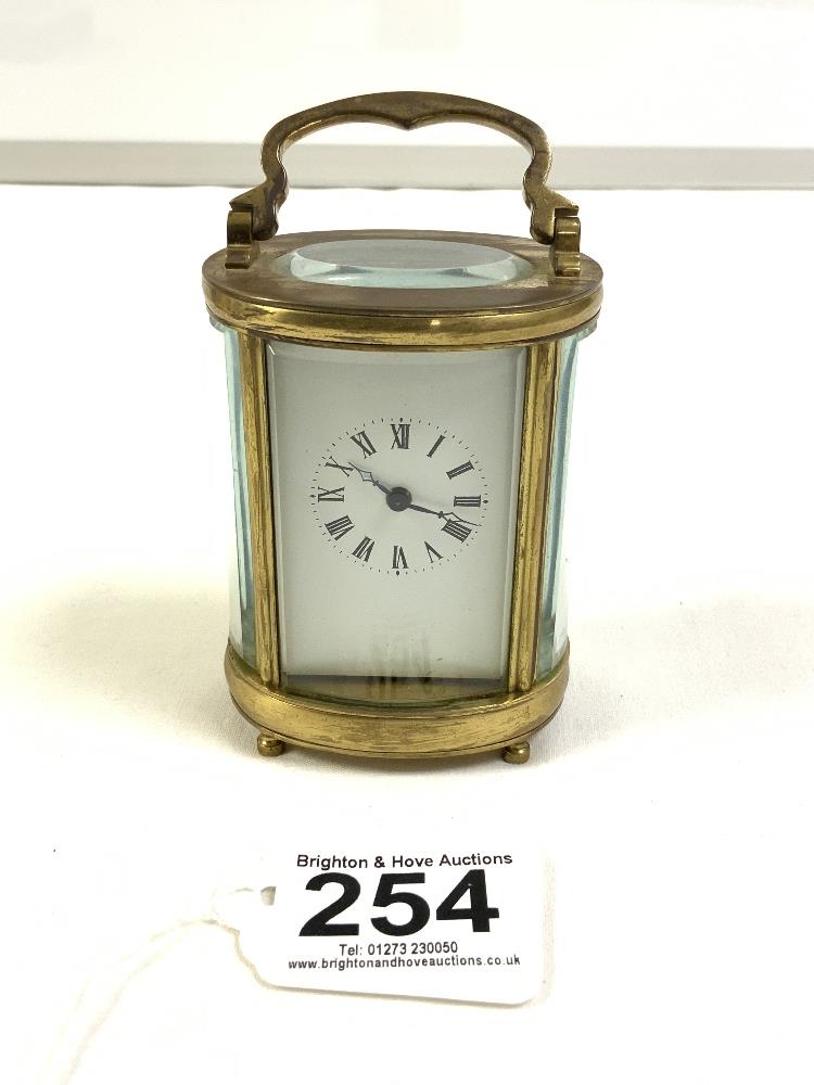 SWISS-MADE SMALL OVAL CARRIAGE CLOCK, 11CMS