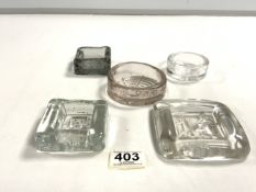 FIVE ERIC HOGLAND CLEAR GLASS EMBOSSED PAPERWEIGHTS