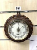 VINTAGE WOODEN ROUND ROPE DESIGN WALL BAROMETER (W. HEYWOOD OPTICIAN)