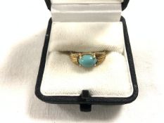 18CT GOLD RING SET WITH OVAL TURQUOISE 2.73 GRAMS