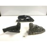 THREE INUIT HARDSTONE CARVINGS-A POLAR BEAR EATING A WALRUS WITH SIGNATURE TO BASE JOHNNY P 36CMS