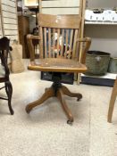 EARLY 20TH CENTURY OAK AND LEATHER SWIVEL DESK CHAIR