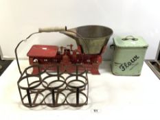 WROUGHT IRON SIX BOTTLE CARRIER, AN ENAMEL FLOUR BIN, AND A SET OF IRON 10KG SCALES WITH BRASS