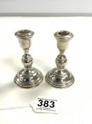 A PAIR OF 800 STAMPED WHITE METAL BALUSTER-SHAPED CANDLESTICKS, 10CMS, 86 GRAMS