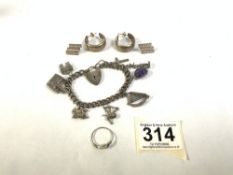 SILVER 9-CHARM BRACELET, 45 GRAMS, TWO PAIRS OF WHITE METAL EARRINGS AND A SILVER PEARL RING