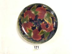 WILLIAM MOORCROFT CIRCULAR WALL PLATE, 22CMS